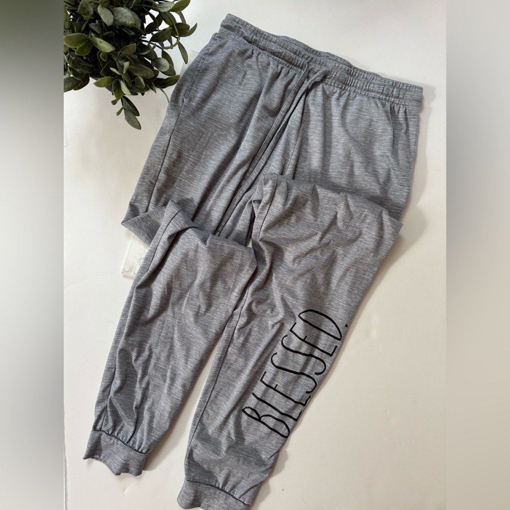 Rae Dunn Joggers size S with blessed on the bottom of the left leg .